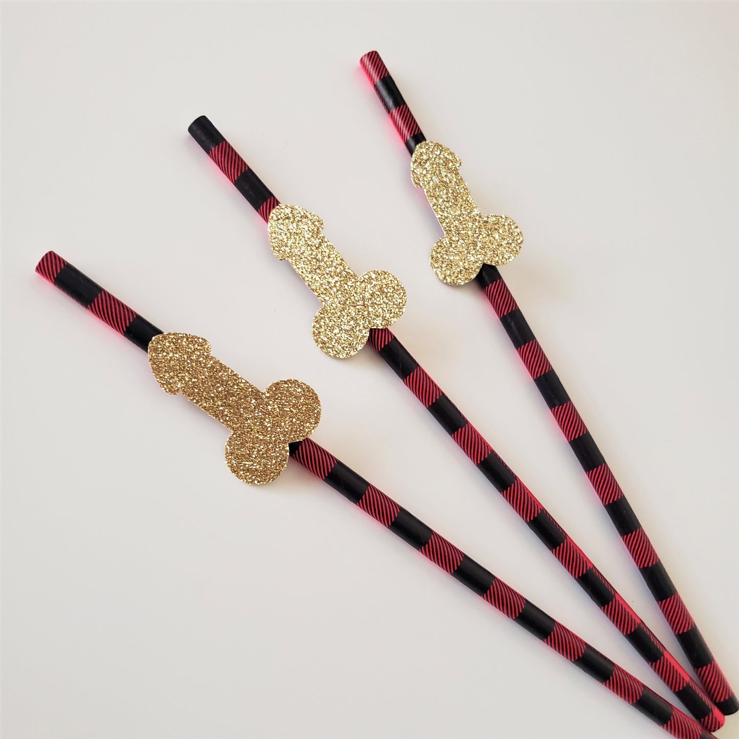 three gold glitter flannel penis straws